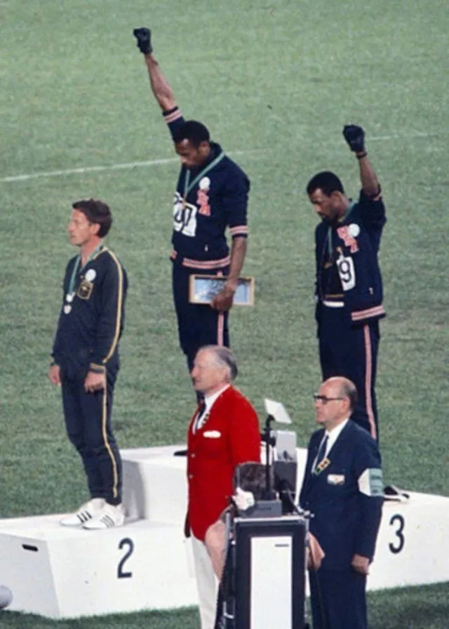 John_Carlos,_Tommie_Smith,_Peter_Norman_1968cr.webp