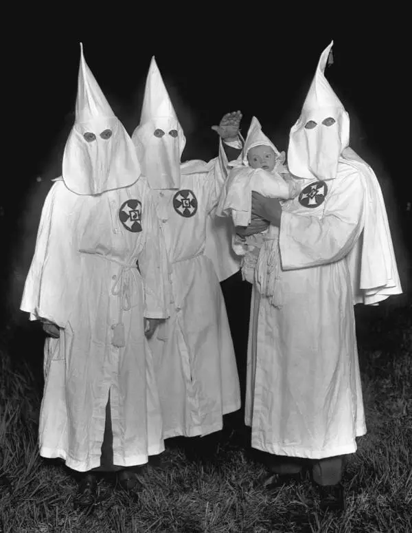 kkk-members-with-child.webp