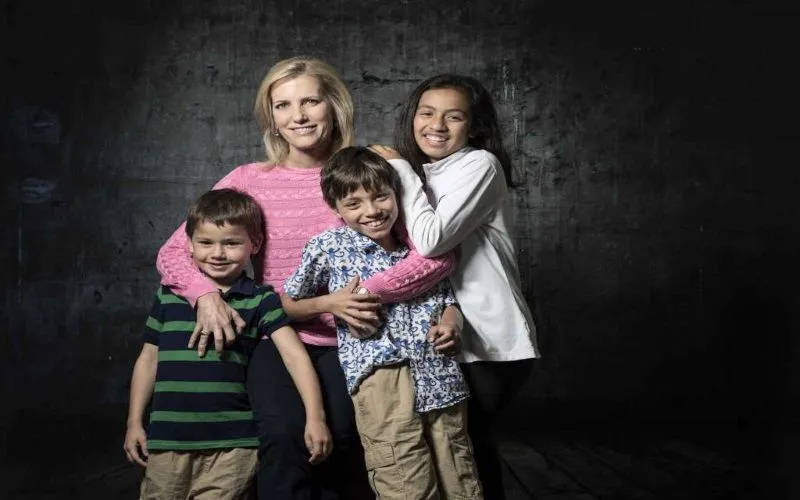 laura-ingraham-with-her-three-adopted-children.webp