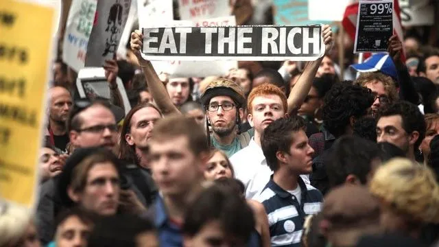 leftwingprotestersoccupy-wall-street_eat-the-rich.webp