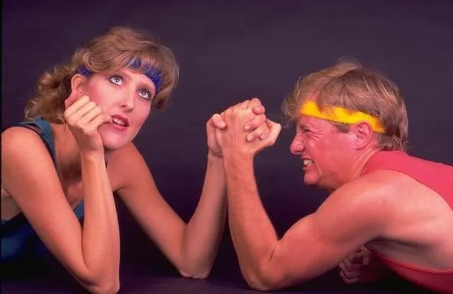 man-and-woman-arm-wrestling.webp