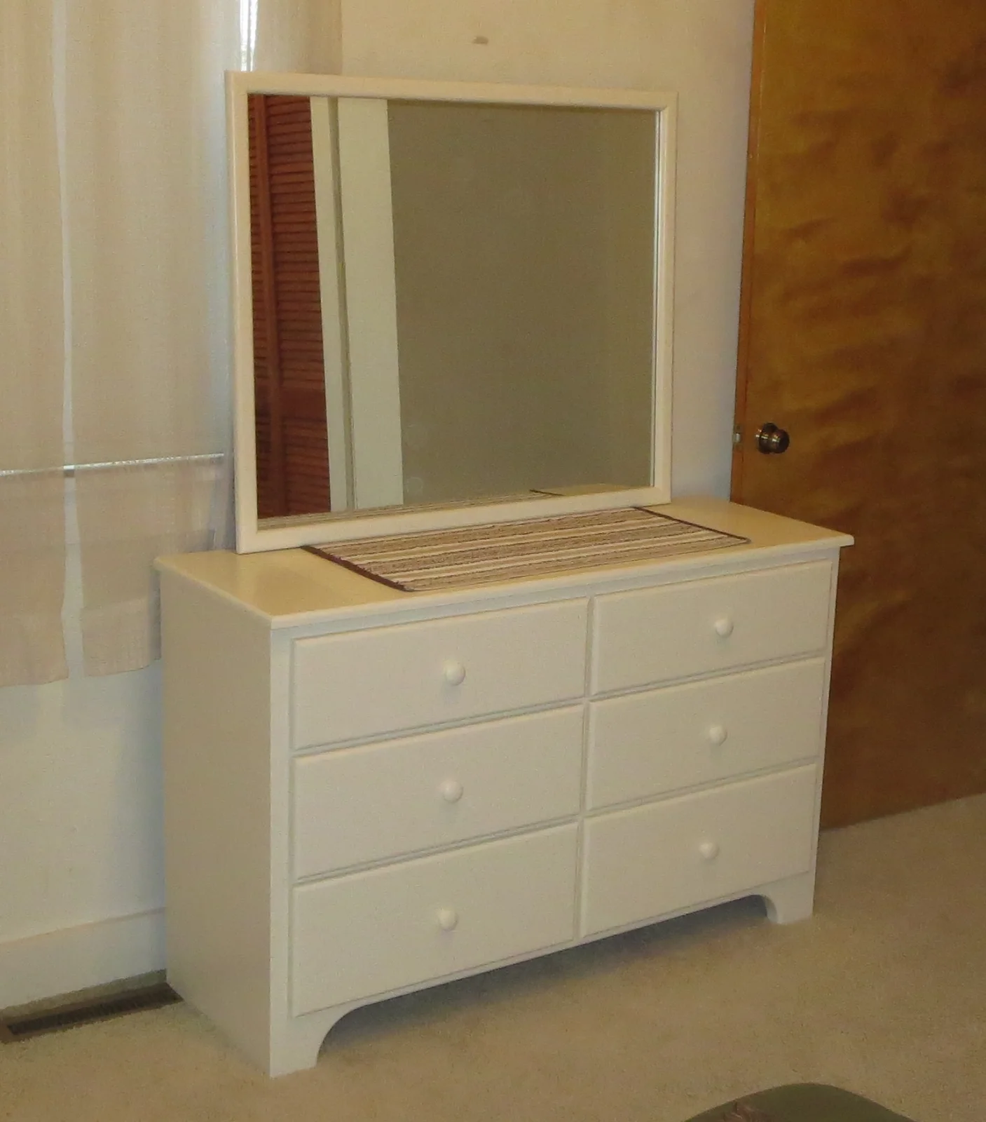 Mirrored dresser.webp