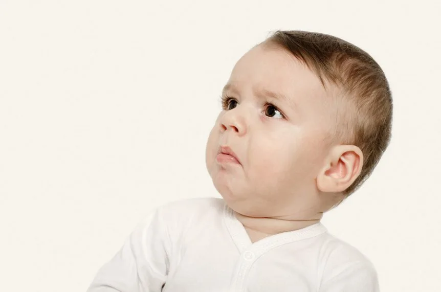 photo-of-a-baby-with-a-wtf-face-862x571.webp