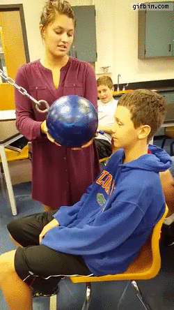 poster-kid-does-pendulum-ball-to-the-face-experiment-in-class.gif