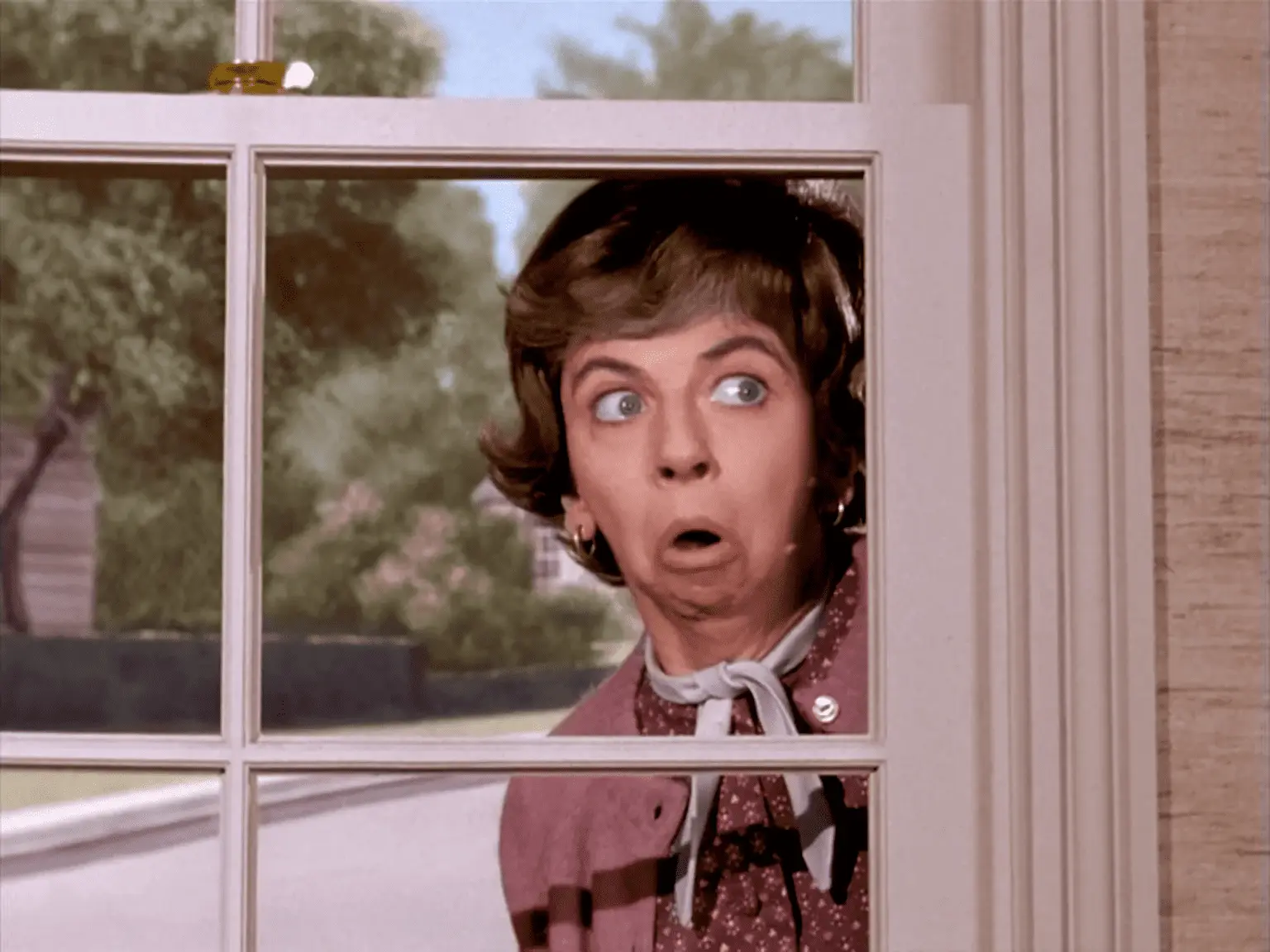 S1E2_Colorized_-_Gladys_peeking_through_window.webp