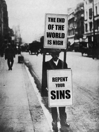 sandwich-board-man-warns-us-of-impending-doom.webp