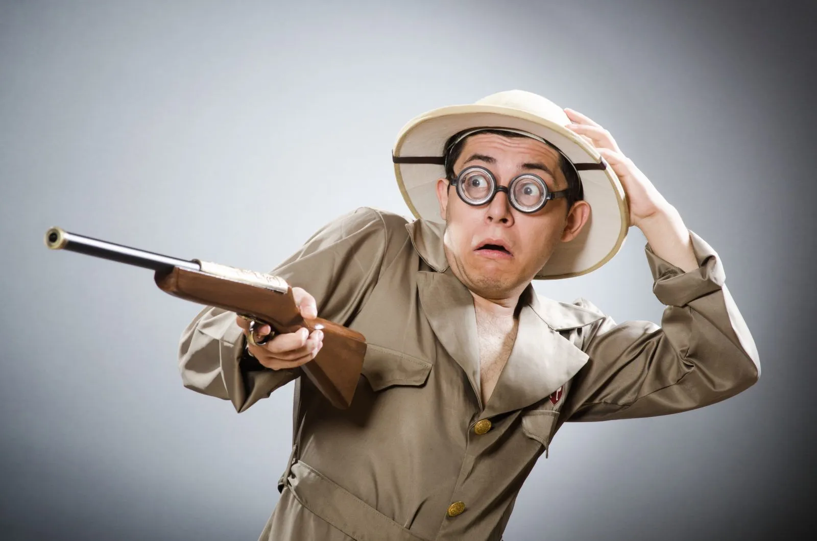 scared-man-with-gun-adobe.webp