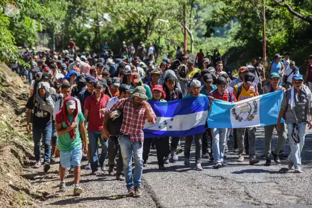 Screenshot_2021-01-06 migrant caravan waving flags - Google Search.webp
