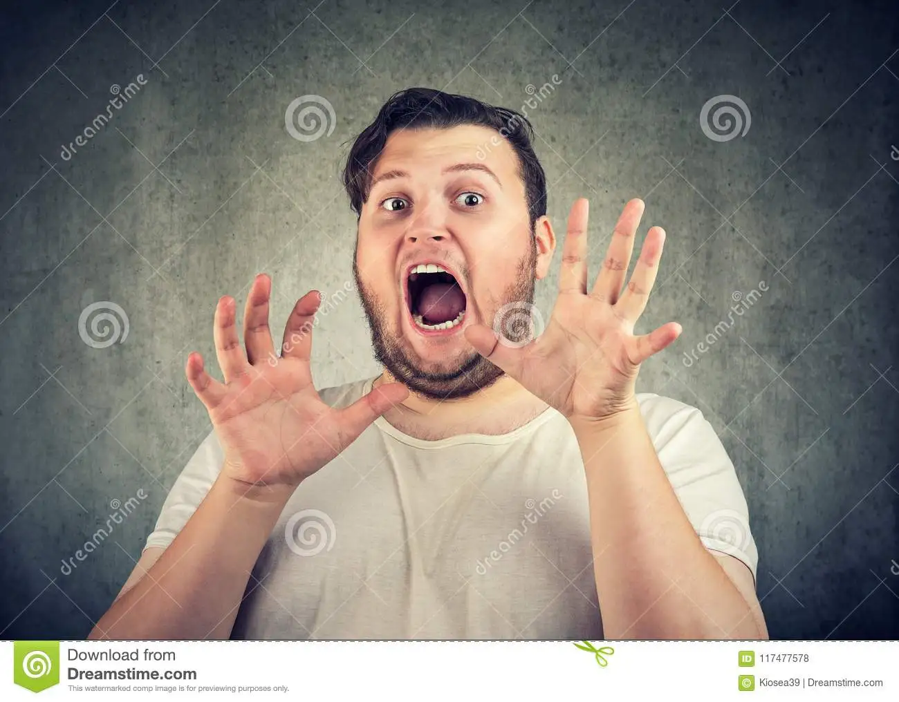 shocked-man-panic-holding-hands-up-chubby-casual-man-holding-hands-front-face-screaming-fear-...webp