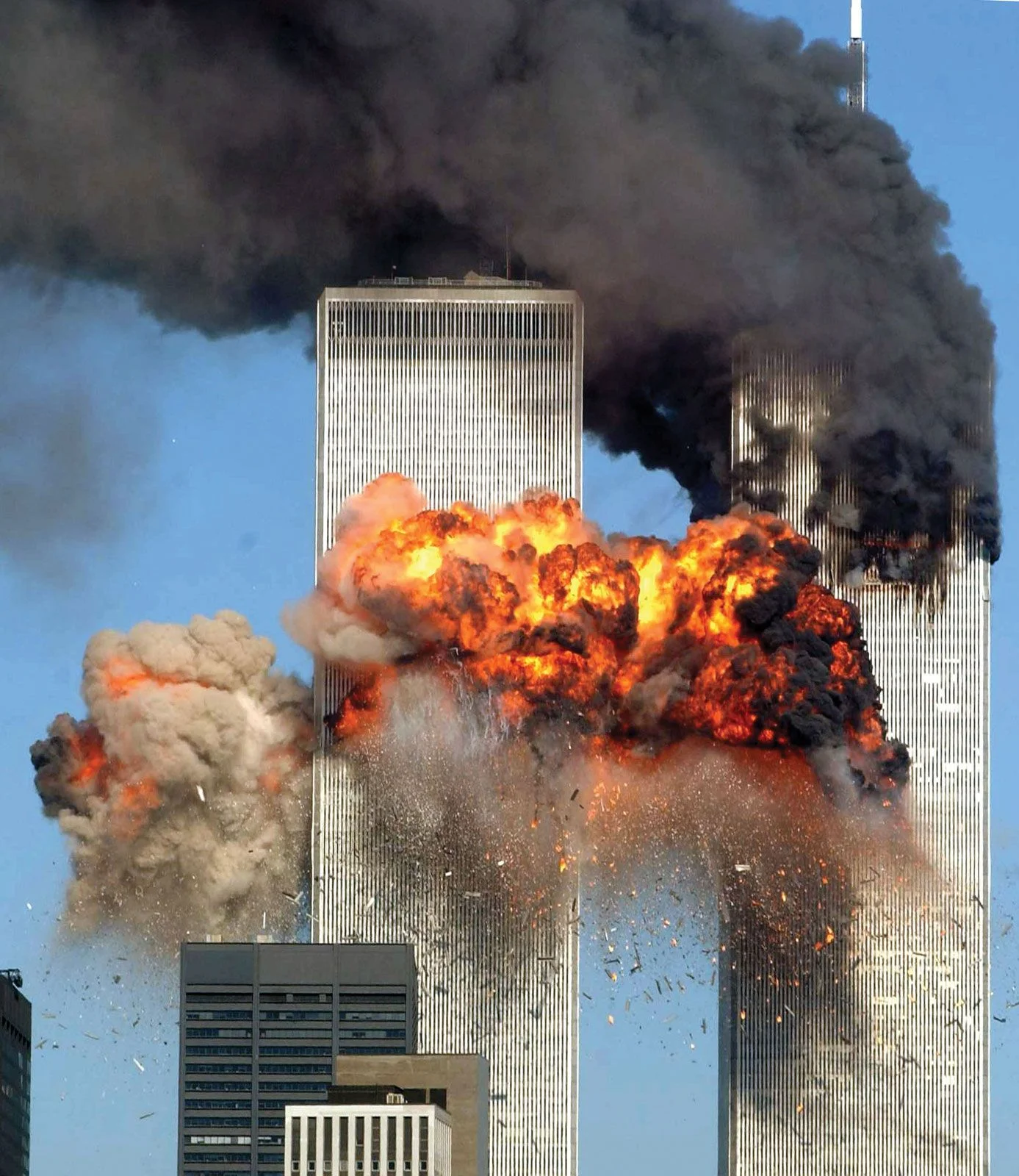 Smoke-flames-twin-towers-attacks-World-Trade-September-11-2001.webp