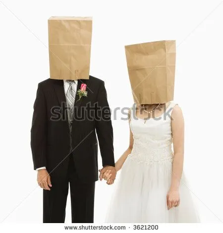 stock-photo-caucasian-groom-and-asian-bride-with-brown-paper-bags-over-their-heads-3621200.webp
