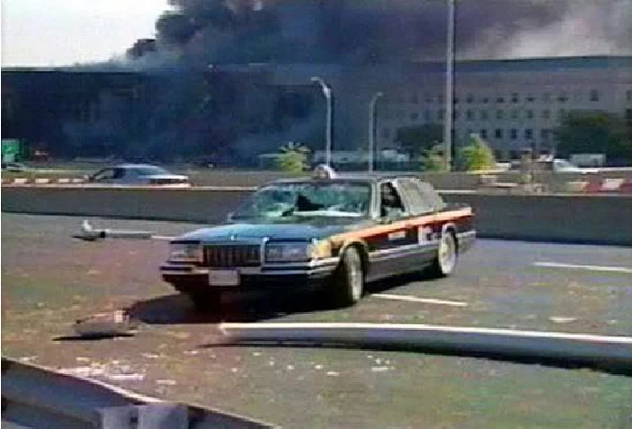Taxi-damaged-by-felled-and-severed-light-pole.webp