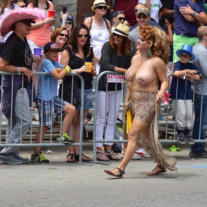 Topless_woman_at_Chicago_Pride.webp