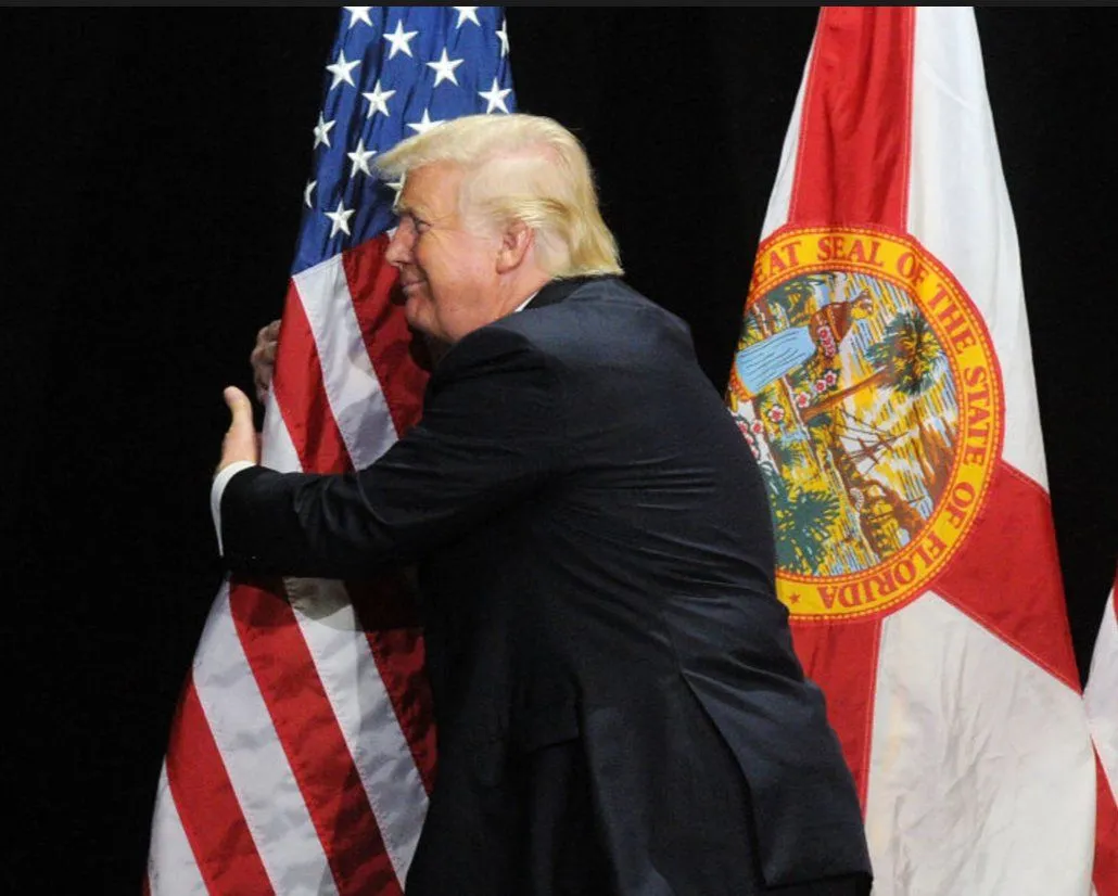 trump hug flag.webp