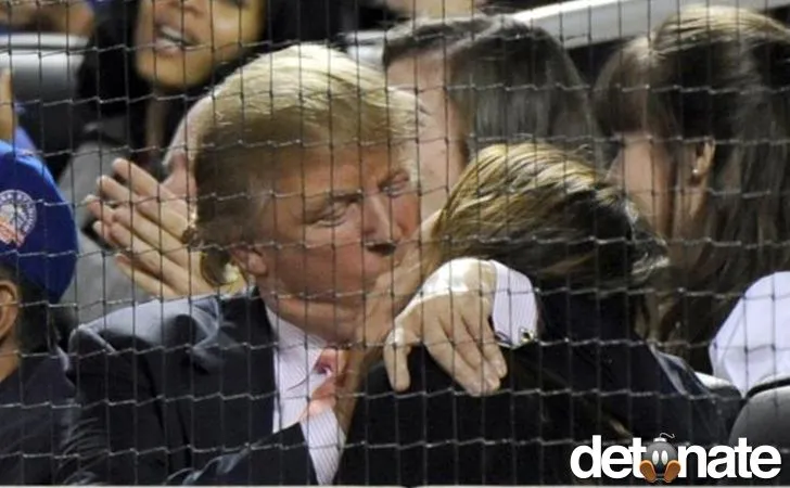 Trump kissing behind home plate.webp