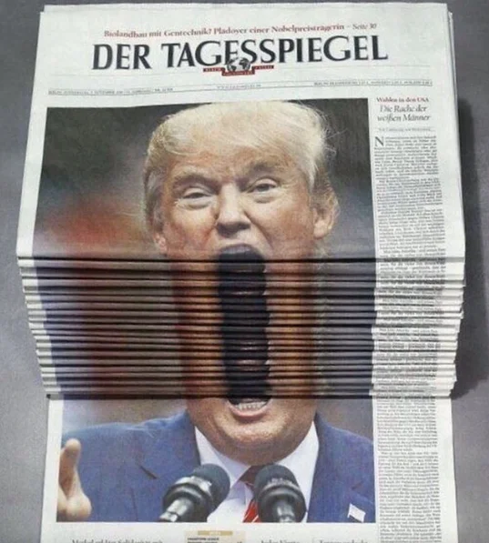 Trump newspaper stack.webp