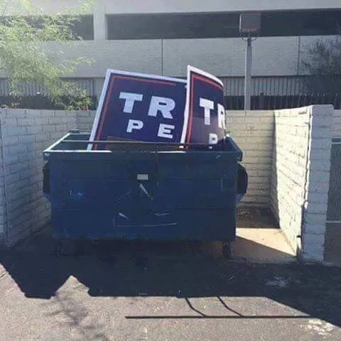 Trump signs dumpster..webp