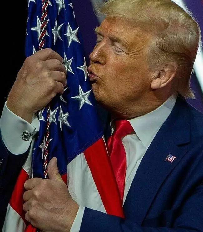 Trumphuggingflag.webp