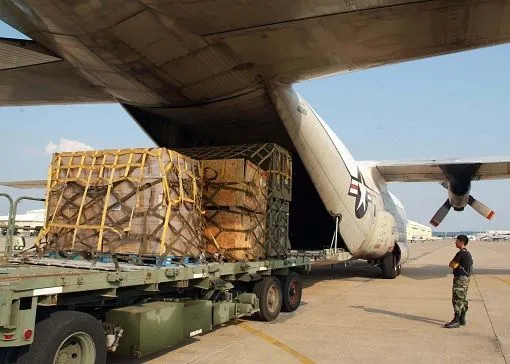 US-Navy-Plane-wooden-pallets-stacked-with-Cash.webp