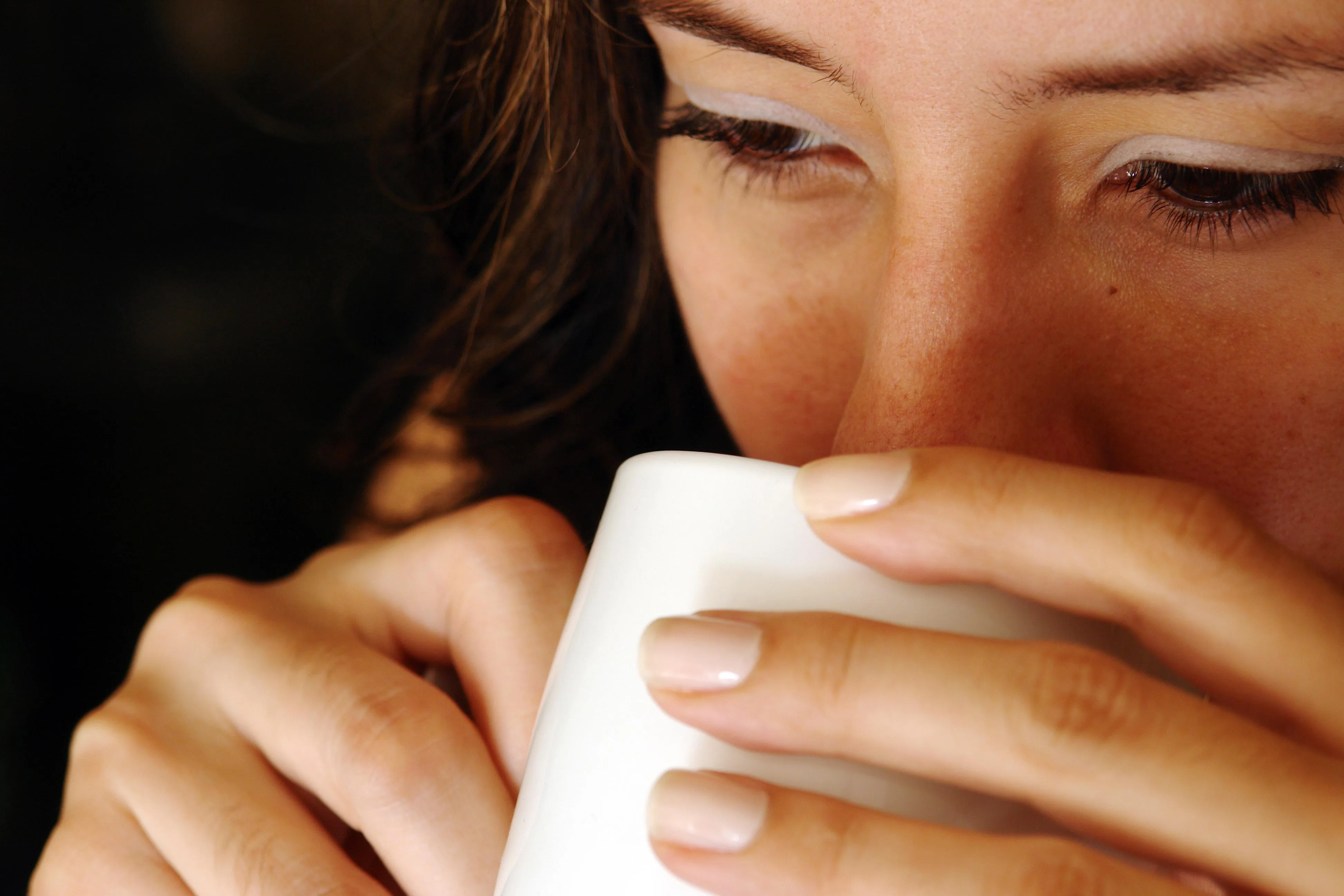 woman-drinking-coffee.webp