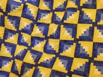 $pinwheel log in blue and gold.webp