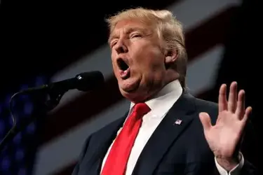 Trump at microphone.webp Trump at microphone.webp