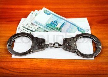 tmp_28729-22680370-russian-rubles-and-handcuffs1195349954.jpg