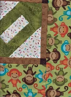$Chain Link Quilt Top, Monkey 44x68 border, 7.5.2012.webp