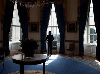 $the-president-looks-out-the-window-of-the-blue-room-before-holding-a-press-conference-the-da...webp