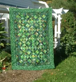 $Green Square within a Square quilt.webp