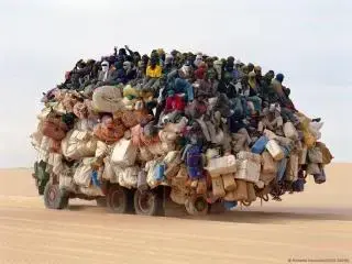 $truck full of people.webp