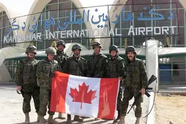 $MIL_Canadian_Flag_Soldiers_Kandahar_lg.webp