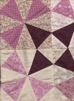 $Kaliedoscope Medallion Rosewood quilt top1.webp