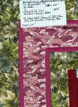 $SA Kaliedoscope Medallion Rosewood Quilt Top Information.webp