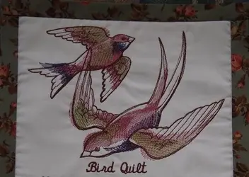 $1 Allie emb bird-quilt.webp