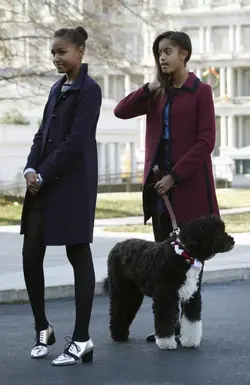 $sasha-and-malia-obama-2013.webp