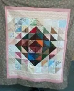 $Half square triangle Charity Bees Quilt by becki.webp