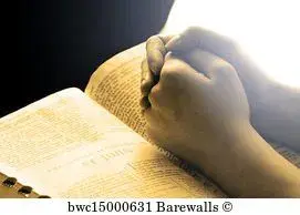 hands-praying-on-bible_bwc15000631.webp