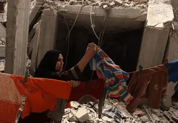 Bombed-out Building and Clothes Line.webp