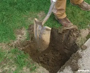 Digging-a-post-hole.webp