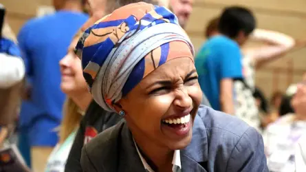 ilhan-laughing.webp