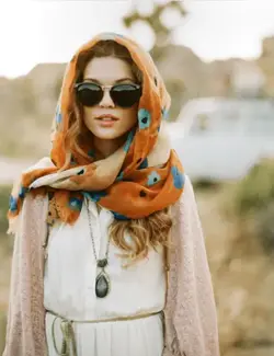 woman wearing scarf over head.webp