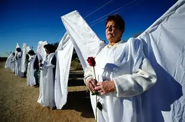 $g-cvr-110114-Roll-funeral-1146a_grid-6x2.jpgangels.webp