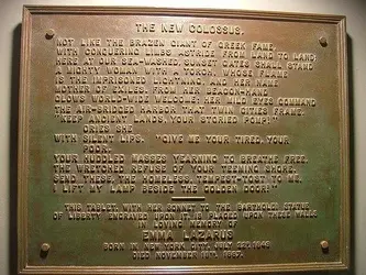 Bronze-plaque-of-New-Colossus.webp