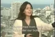179px-Hanan_El_Masr's_reaction_to_Hamas_firing_a_rocket_from_under_her_News_Outlets_office_bui...jpg