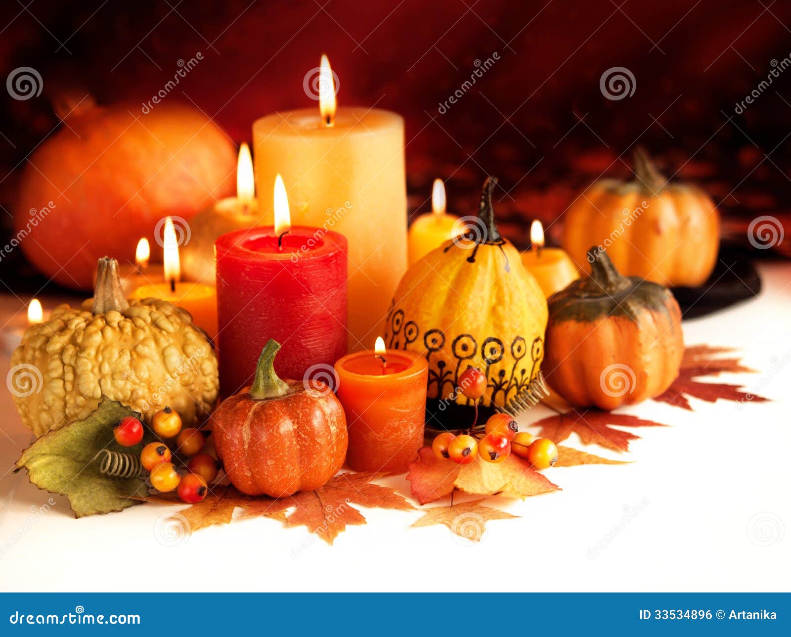 candle-pumpkins-autumn-background-33534896.jpg