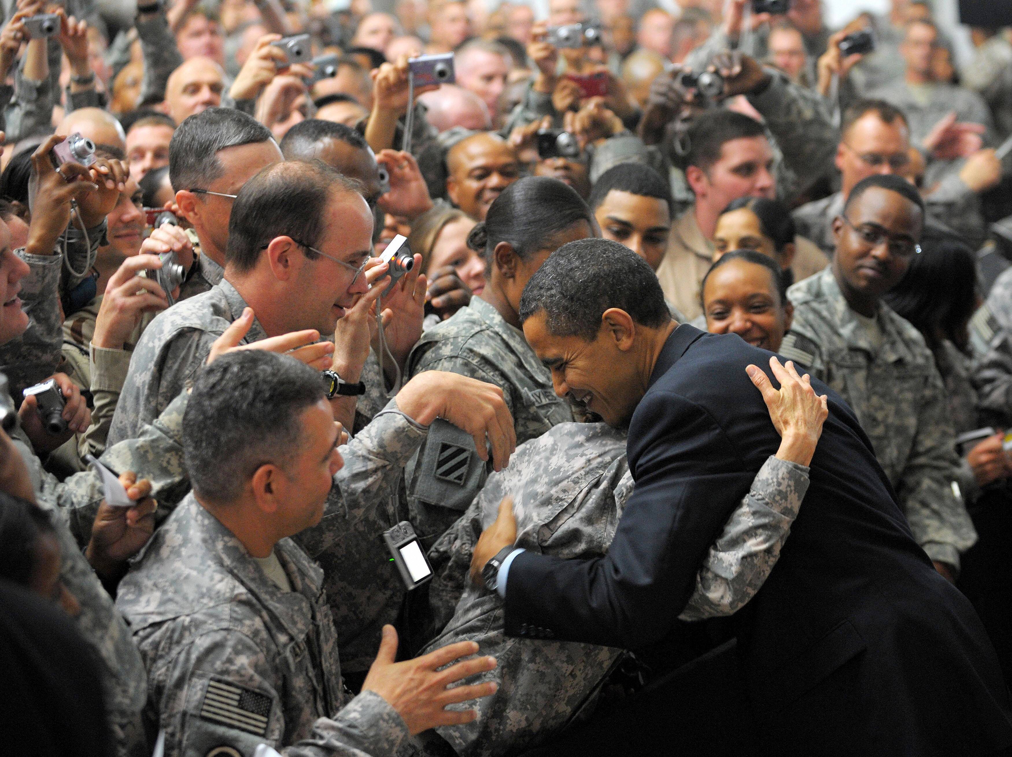 obama.troops.embrace.jpg