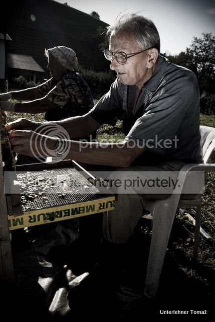 old-man-working-the-old-task-a18633419.jpg