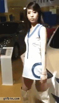 1340302096_girl_at_auto_show_dances.gif