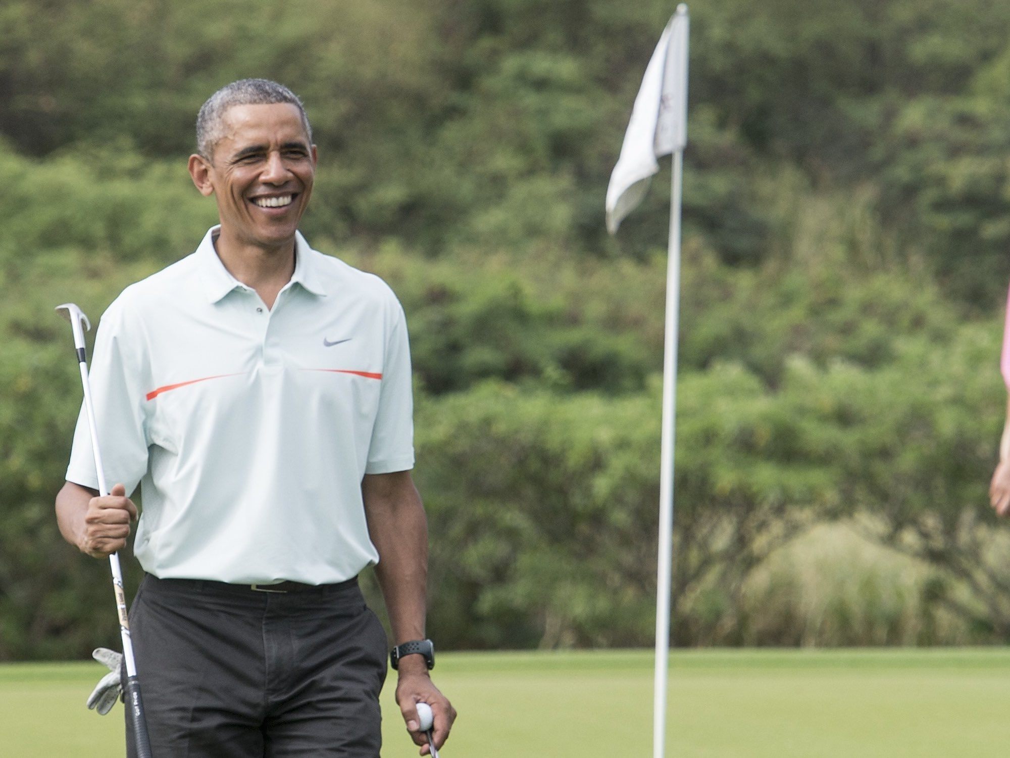Obama-Golf-Nicholas-Kamm-AFP-Getty.jpg